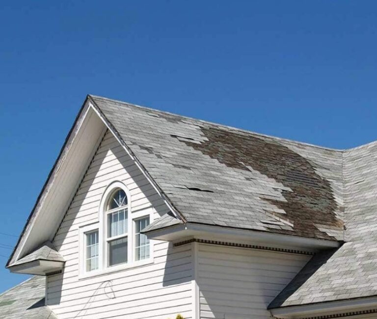 storm damage roof restoration in Northport, AL